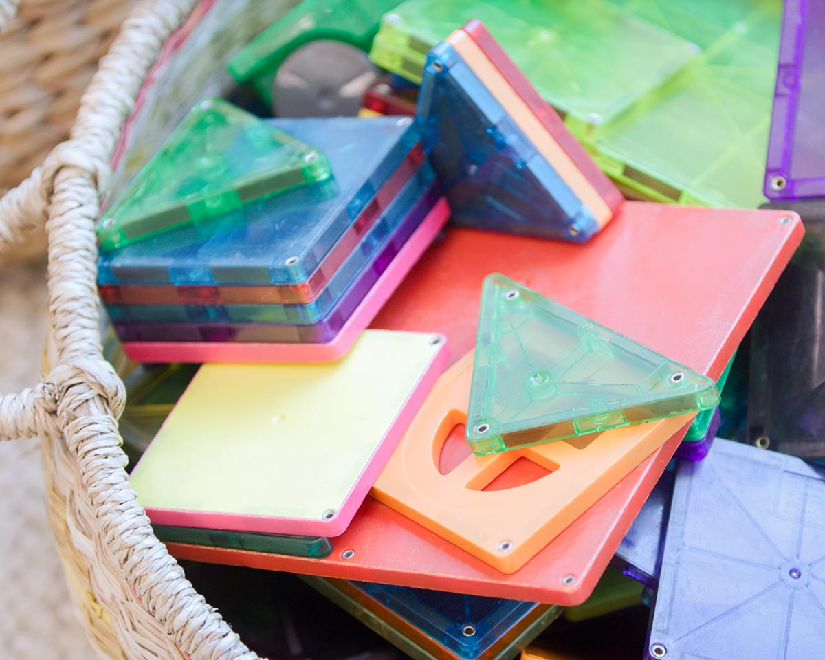 Colourful magnetic learning blocks used during child therapy sessions at HeartSoundMind Consulting.