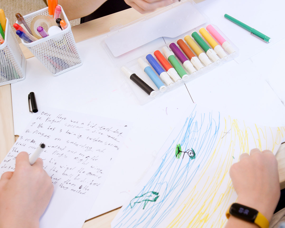 Child drawing during a therapy activity at HeartSoundMind Consulting.